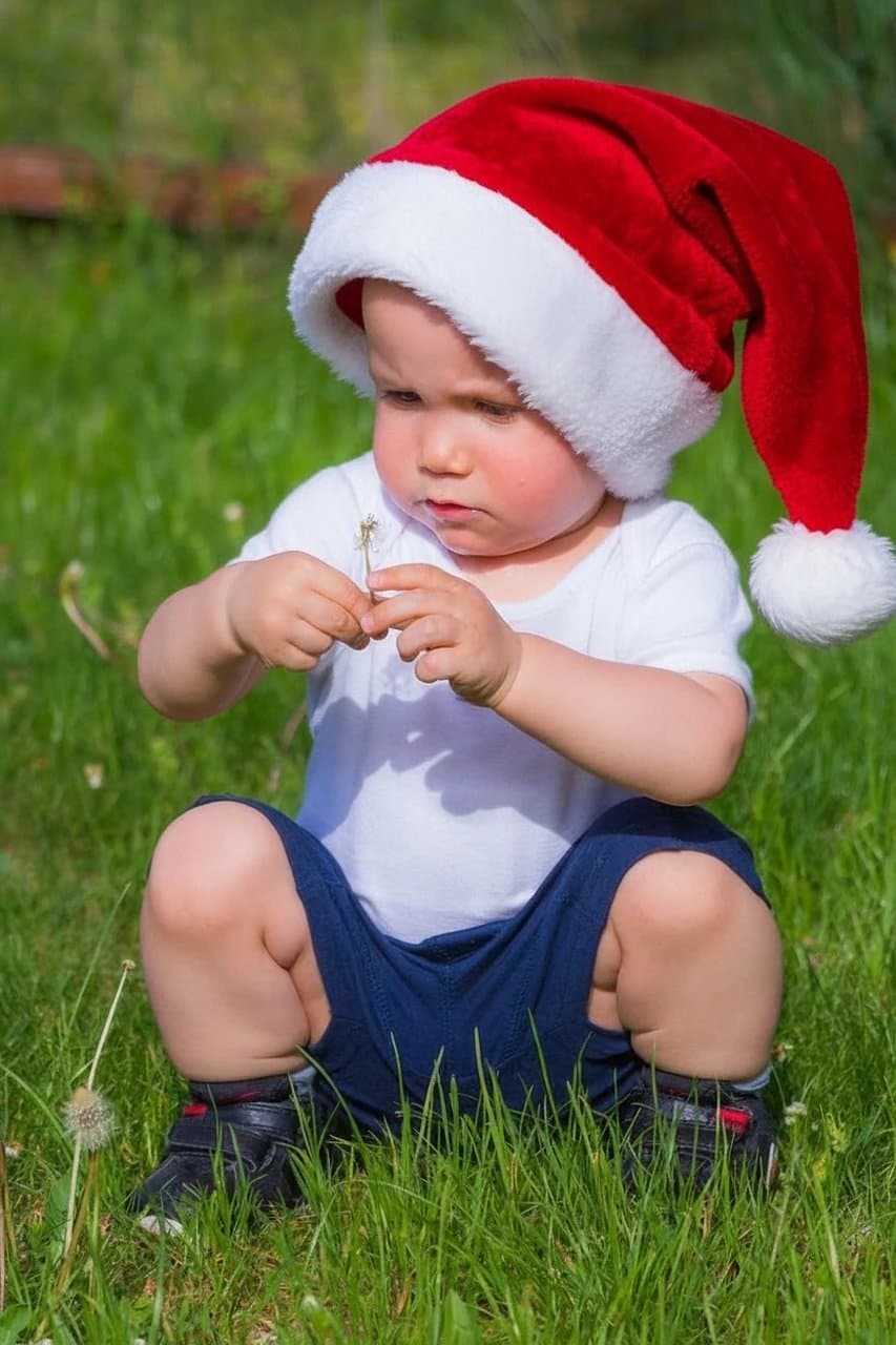 AI Santa hat filter after transformation - group photo with everyone wearing virtual Santa hats