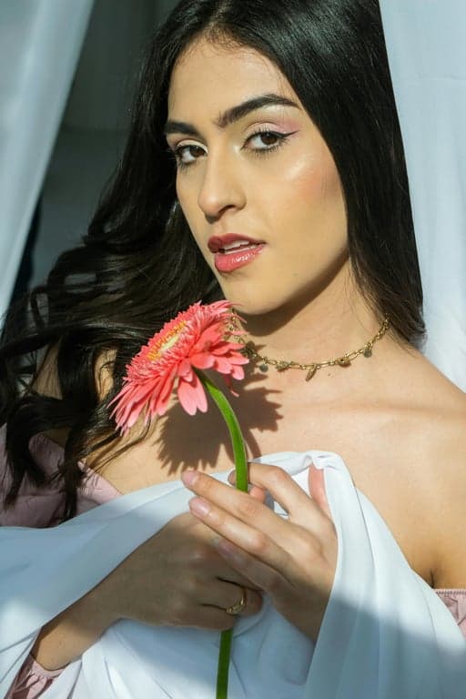 image to emoji converter before - a woman smiling with long dark hair