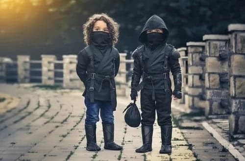 Ninja outfit after – child in full black ninja outfit with mask