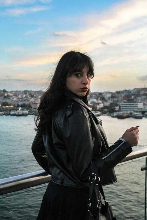 a portrait of a person depicted as a spider-themed superhero, focusing on suit detail, athletic proportions, and iconic heroic presence