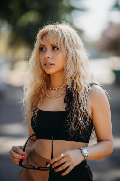 create a natural-looking bangs hairstyle that integrates smoothly with existing hair, preserving lighting consistency, hair direction, and realistic strand behavior