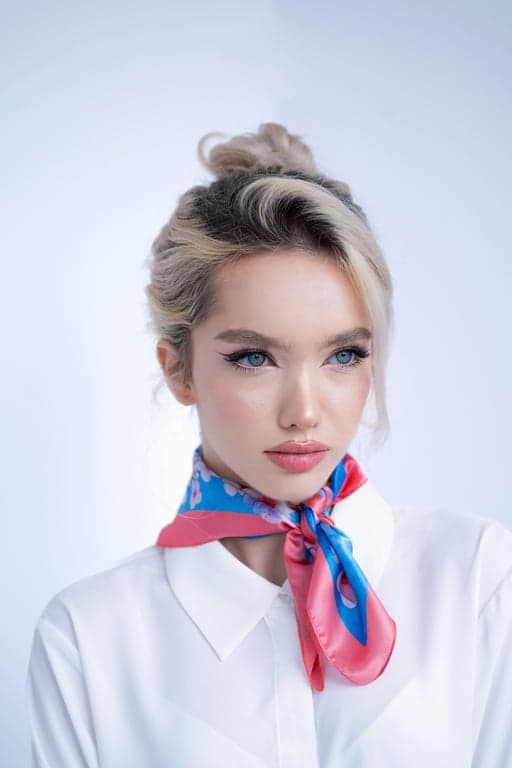 a portrait of a person styled in a classic 70s vintage outfit, featuring high-waisted flared trousers, fitted or softly draped tops, visible seam lines, warm earthy solid colors or retro prints, relaxed confident posture, and soft film-like lighting