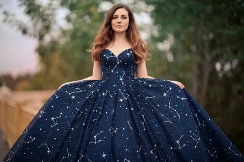 Princess dress after – person wearing a starry night themed gown with twinkling motifs