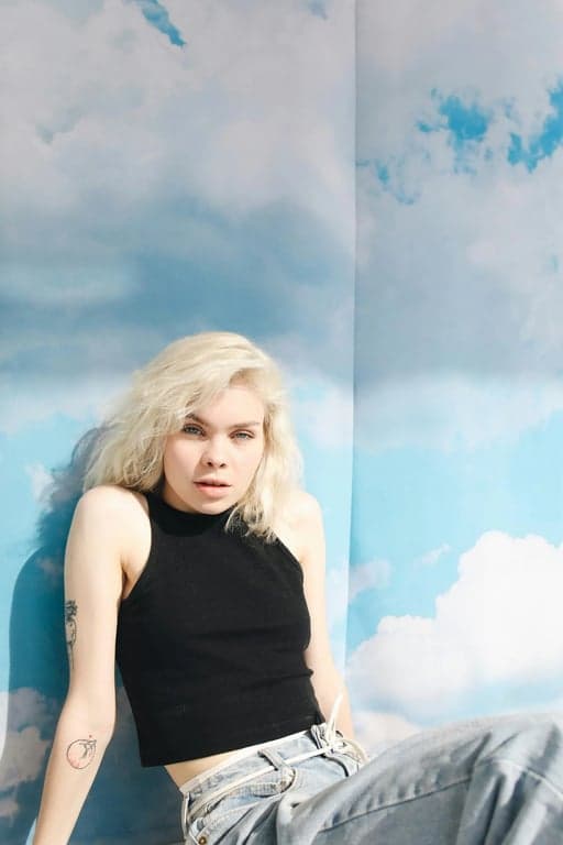 a portrait stylized as a SpongeBob animation still, with reduced realism, cartoon facial features, bright flat colors, thick outlines, and a friendly children’s cartoon vibe.