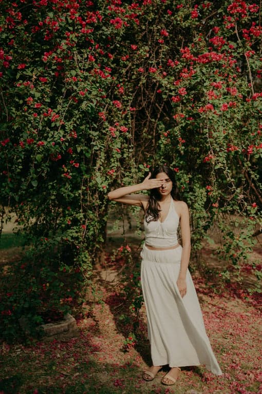 a portrait of a person edited to resemble an Attack on Titan–style anime character, focusing on realism, tension, and cinematic depth