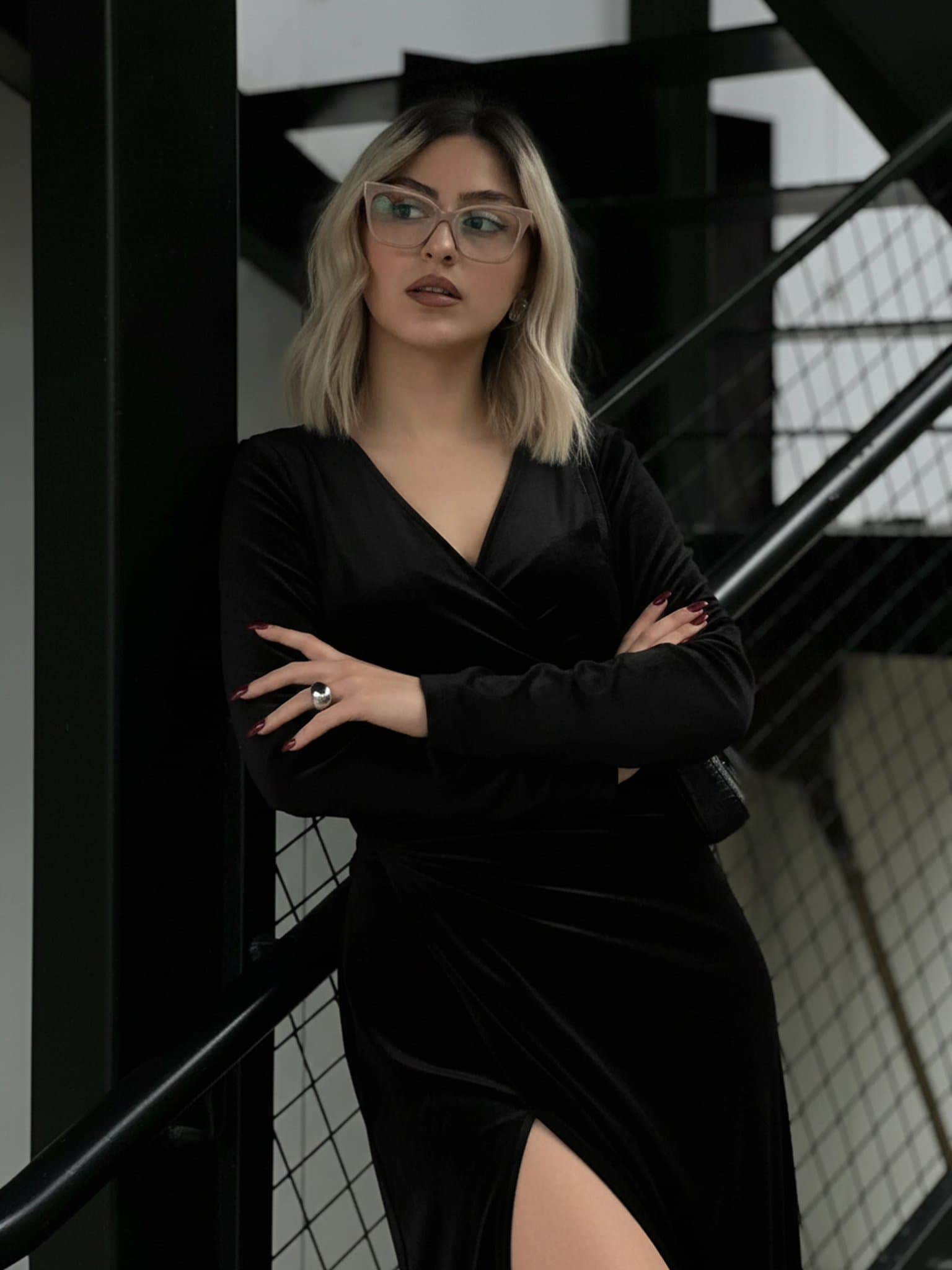 Virtual fashion swap to a black velvet evening gown with a high thigh slit, a classic formal prom style.