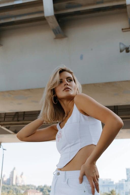 a high-quality GTA-inspired illustration that looks like official game artwork, preserving the original person’s identity while applying strong stylization and visual impact