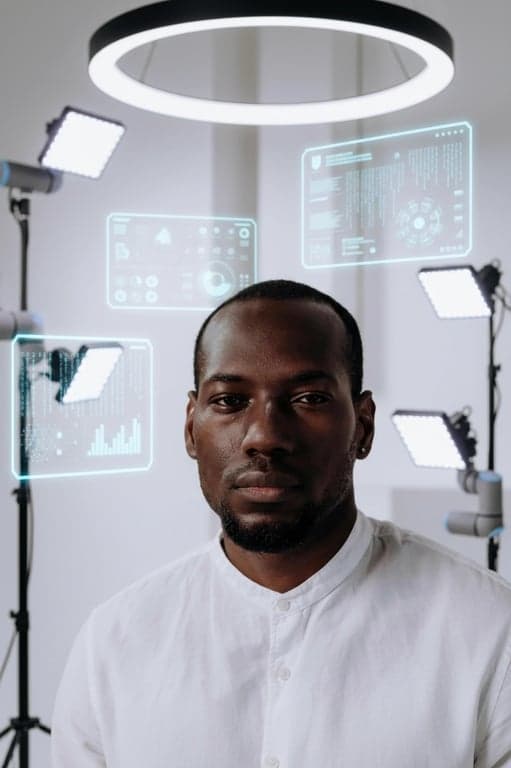 a portrait of a man, ai portrait studio, professional lighting setup, clean backdrop, sharp focus, natural expression.