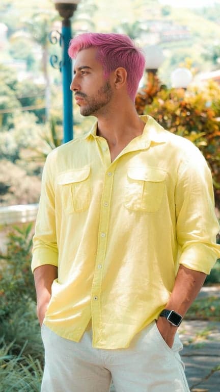 a portrait of a person transformed with a clean pink hair filter, emphasizing believable color, texture, and shine