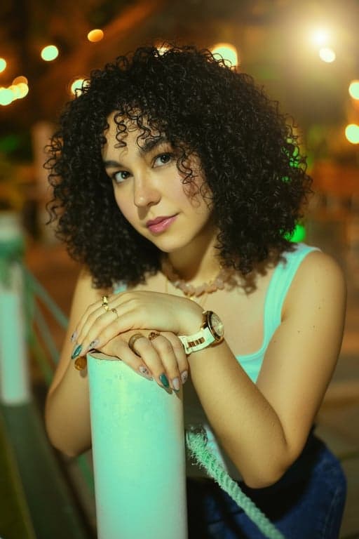 AI shorthair filter after photo - woman portrait with short curly Bob