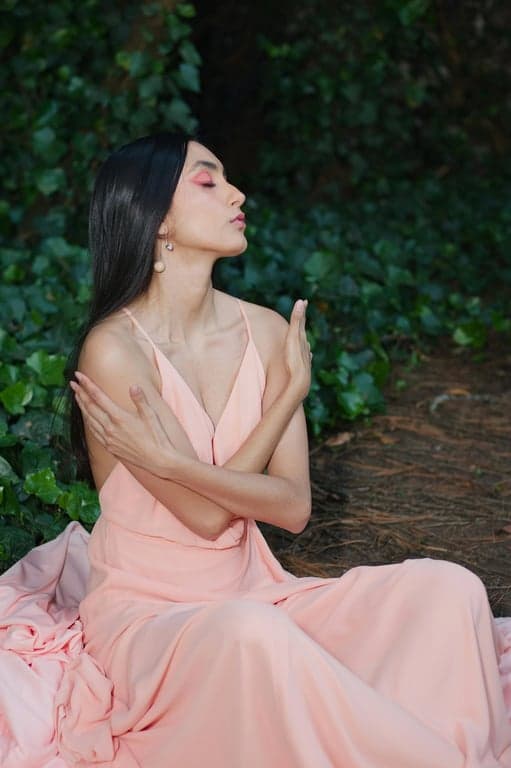 Recreate the original person as a human-style fluffy character in the Hello Kitty parallel world. Preserve hairstyle outline and clothing shape, render the figure as a soft stuffed doll, and place a Hello Kitty plush beside them, both sharing the same plush material, rounded proportions, and pastel palette.