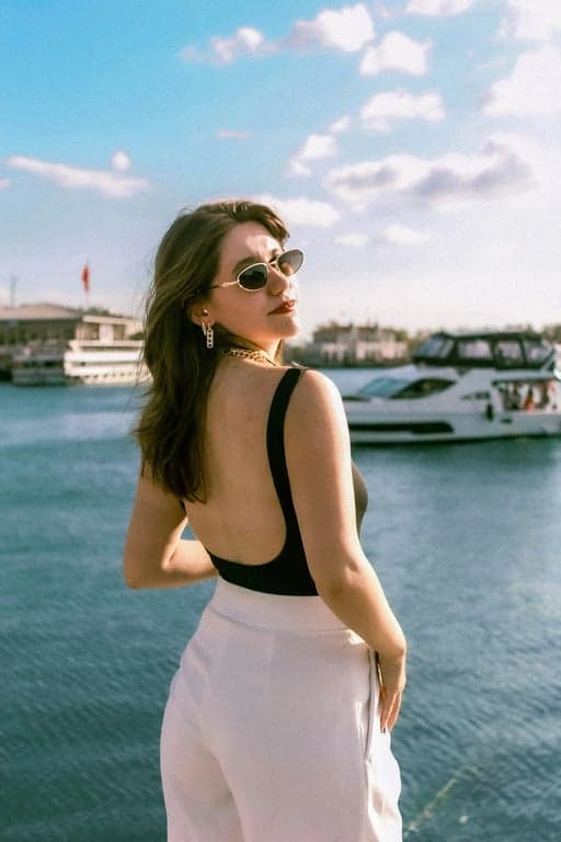 a portrait of a person illustrated in a comic-style pop art look with heavy contour lines, simplified anatomy, flat bright colors, strong color separation, and a playful pop art graphic aesthetic