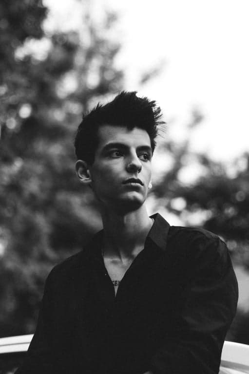 a portrait of a person illustrated in a traditional ukiyo-e–inspired look with flat composition, flowing outlines, minimal detail, and classic Japanese restraint