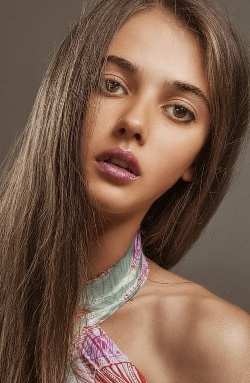 AI red eye remover after transformation - professional portrait with clear natural eyes