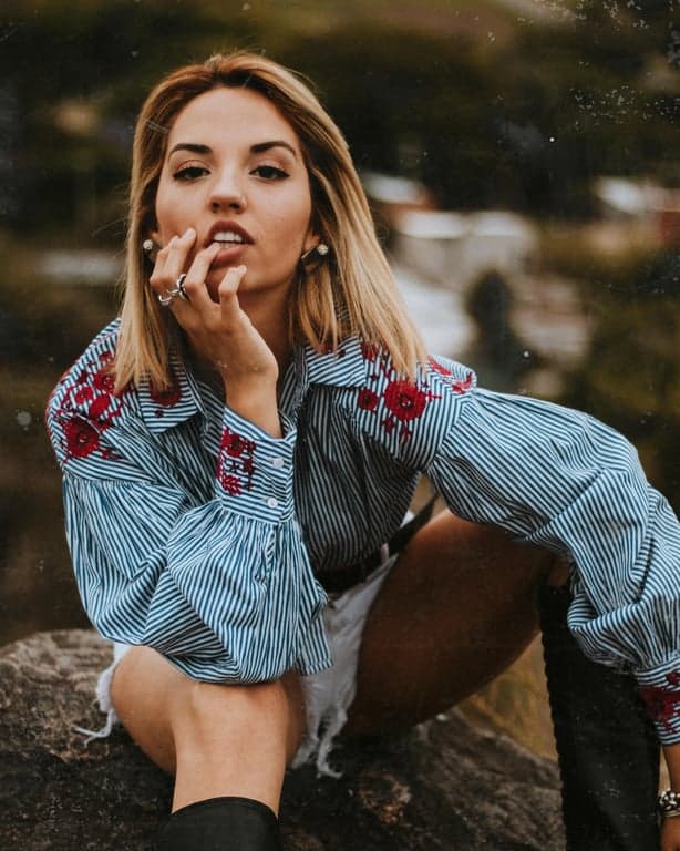 create a virtual fringe try-on result that looks like a real haircut, with soft layering, natural fall, and no visible compositing artifacts