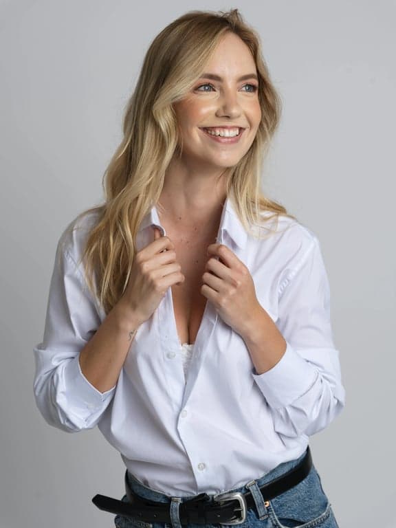 a portrait of a person stylized into an avatar with clean outlines, flattened yet dimensional color layers, simplified clothing, neutral background, and clear visual hierarchy