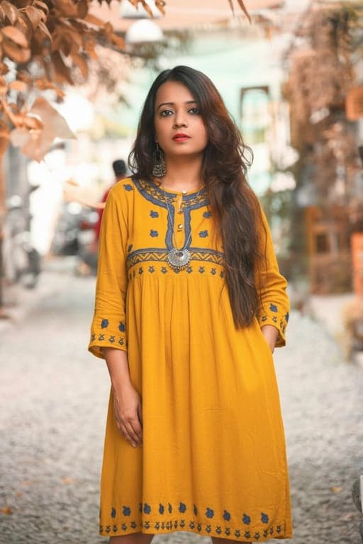 AI dress filter after photo - woman portrait in yellow dress