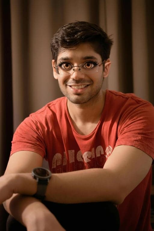 AI big eyes filter after photo - man wearing red shirt after big eyes filter