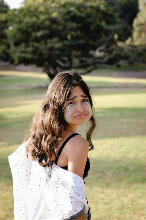 generate a humorous sad expression that looks intentionally exaggerated, avoiding subtle realism and leaning into expressive, meme-ready facial distortion