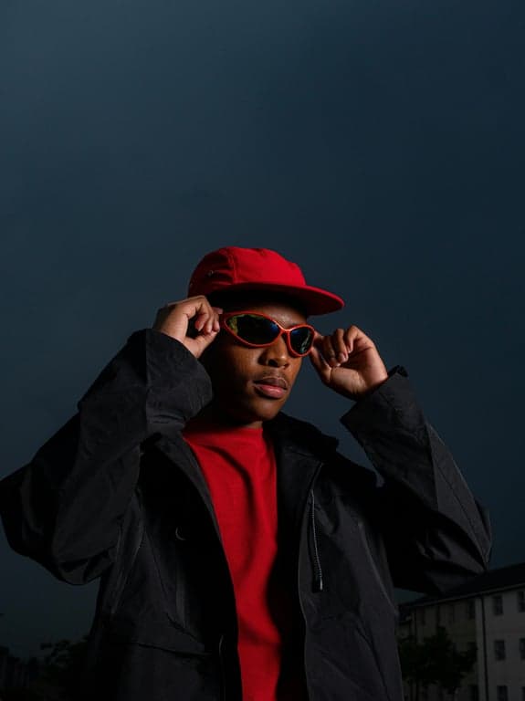 a portrait of a person styled as a corporate profile image with studio lighting setup, neutral colors, realistic facial depth, clean background separation, and a polished executive presence
