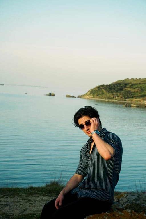 a portrait of a person adapted into a pop art illustration style with high saturation, flat color planes, bold contours, and unmistakable pop art identity