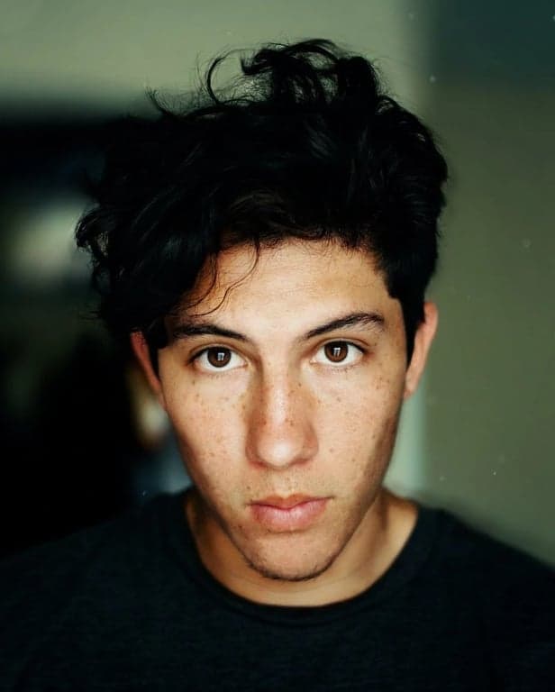 AI eye color changer after transformation - fashion photo with emerald eye color effect