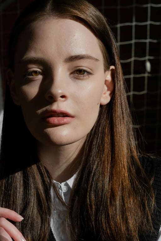 AI Curly hair filter before pic - woman with golden straight hair