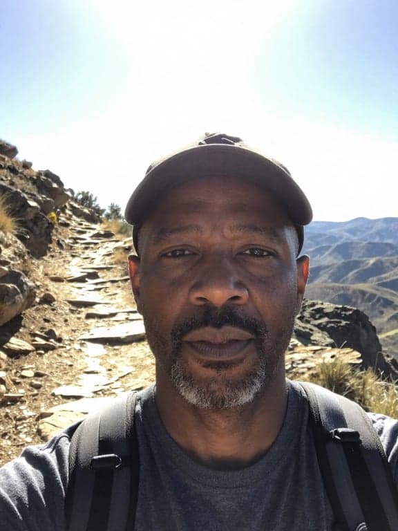 Enhance his natural greying by...