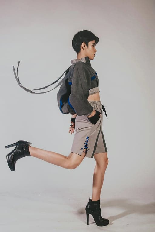 a portrait of a person with a disposable camera aesthetic, including noticeable grain, color shifts, and a snapshot candid feel