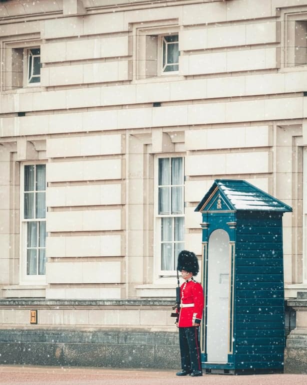 apply snowfall with correct depth perspective, placing larger blurred flakes in the foreground and smaller sharper flakes in the background for spatial realism