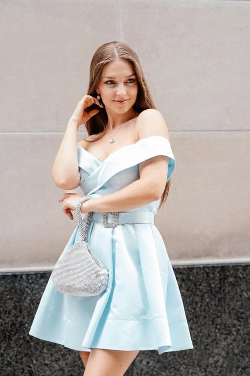 AI Mermaid filter before pic - woman in light blue dress