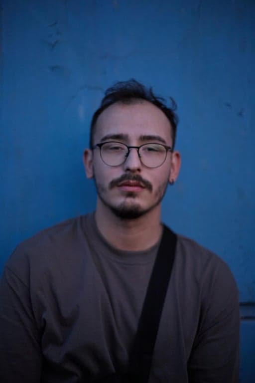 Generate an exaggerated sad facial expression with cartoon-like intensity, featuring oversized watery eyes, deeply drooping eyebrows, dramatically downturned mouth, and amplified facial proportions, creating a humorous and instantly readable “overwhelmed sad” look suitable for social media trends.