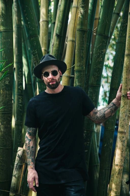 a portrait of a person as a vampire from the series, with pale skin, sharp fangs, and a chilling, supernatural presence