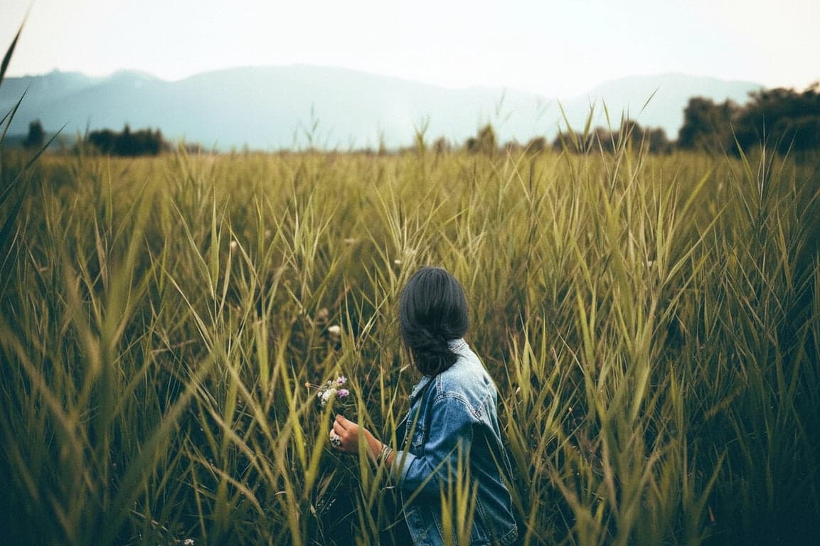 a portrait of a person reimagined with black hair coloration that avoids flat matte appearance