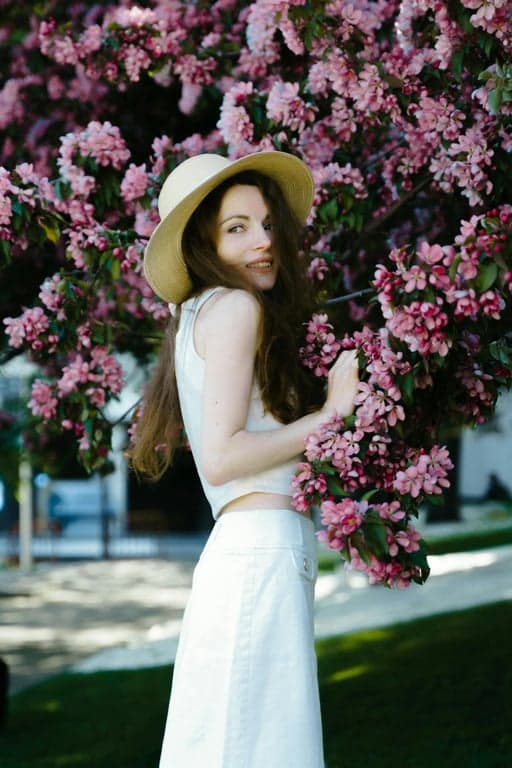 A portrait of a person illustrated as a classic My Little Pony pony character, completely removing human form, enforcing four-legged stance and pony anatomy, preserving background environment and composition, translating personality into mane design, eye emotion, and cutie mark, clean outlines and flat cel shading.